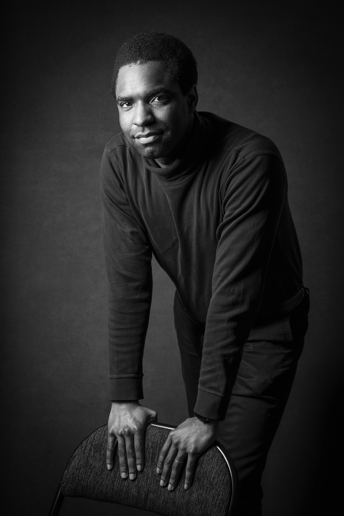 Black-and-white photographic portrait of Portland actor and Portland Playhouse Producing Director Charles Grant. Photo: K.B. Dixon