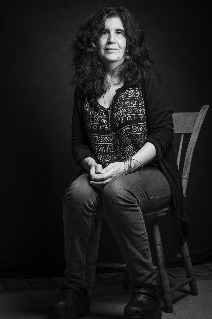 Black-and-white photographic portrait of Emily Ginsburg, Portland conceptual artist andchair of the BFA program at Pacific Northwest College of Art. Photo: K.B. Dixon